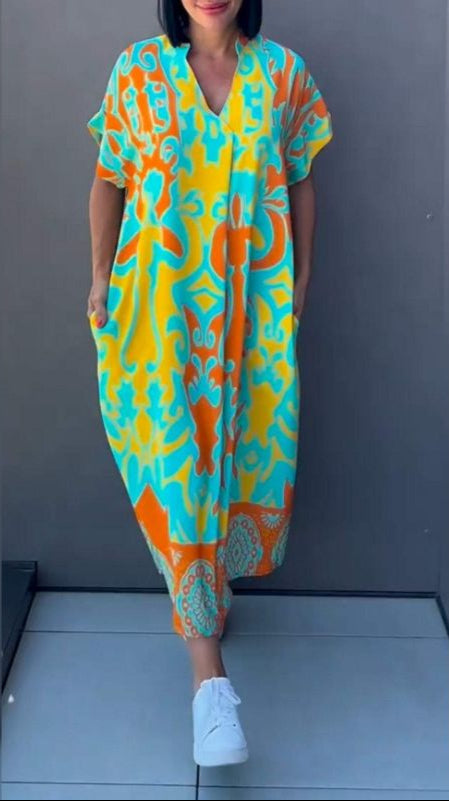 Nia | Robe midi imprimée avec décolleté en V